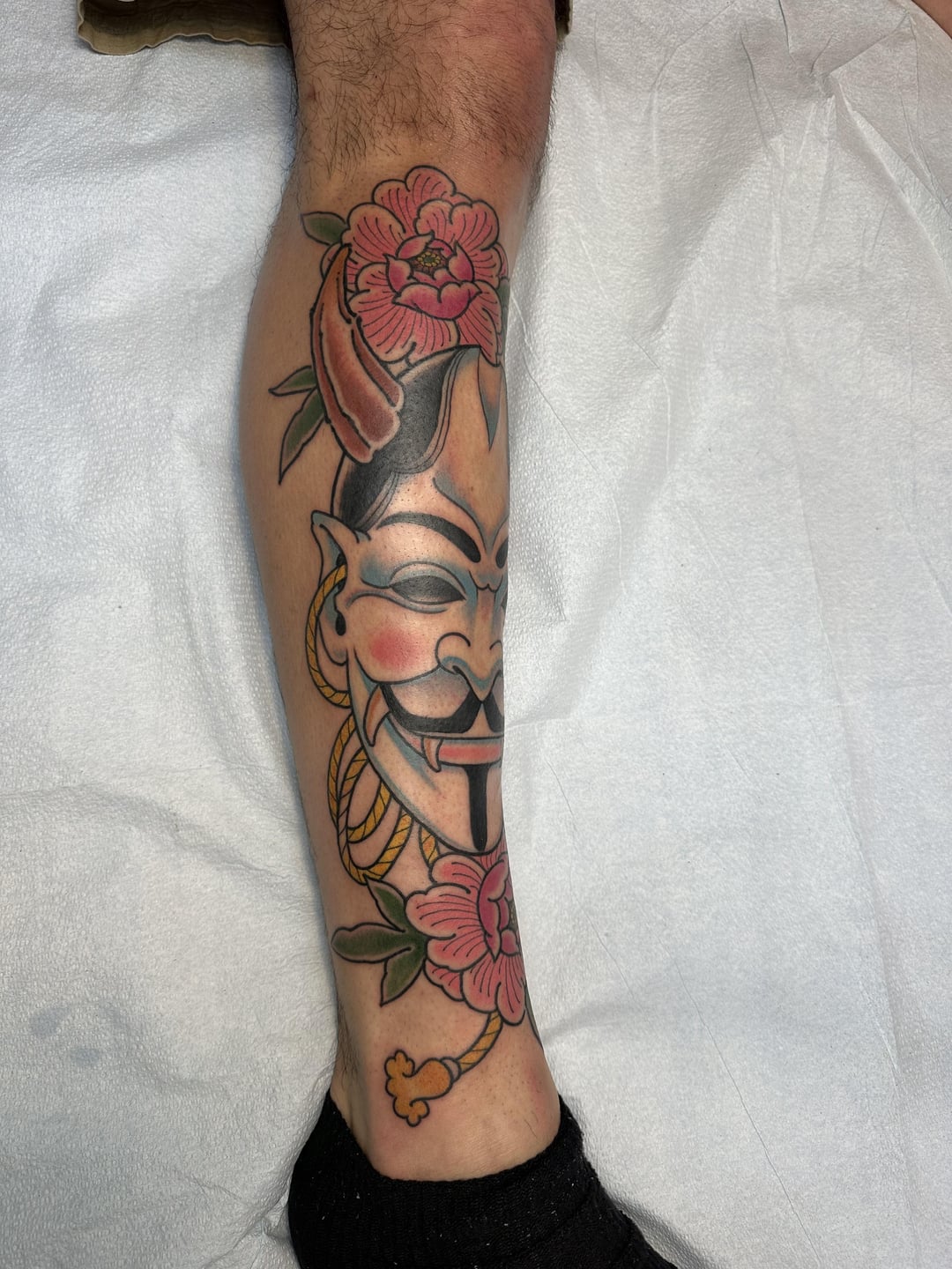 Guy Fawkes mask/Hannya mashup by Daniel Werder at Boarstooth tattoo in LA